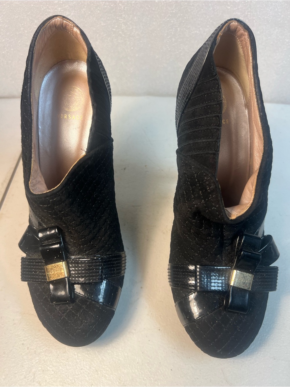 Versace Black Quilted Heeled Booties with Bow and Gold Accent